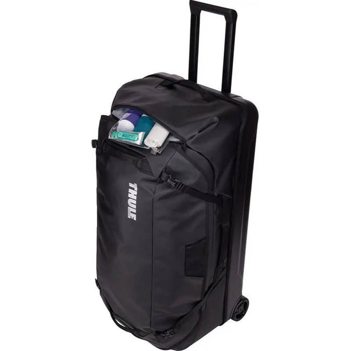 Thule Chasm check 110l in wheeled duffel suitcase black Thule - Dynamic Drive